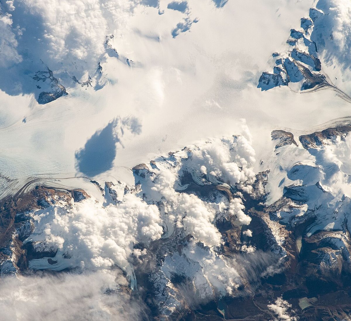 Lenticular clouds forming over Mount Fitz Roy, a sign of strong Patagonian wind