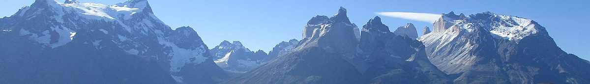 The Cuernos del Paine towering over Lago Nordenskjold on the Mirador Cuernos day hike in Torres del Paine