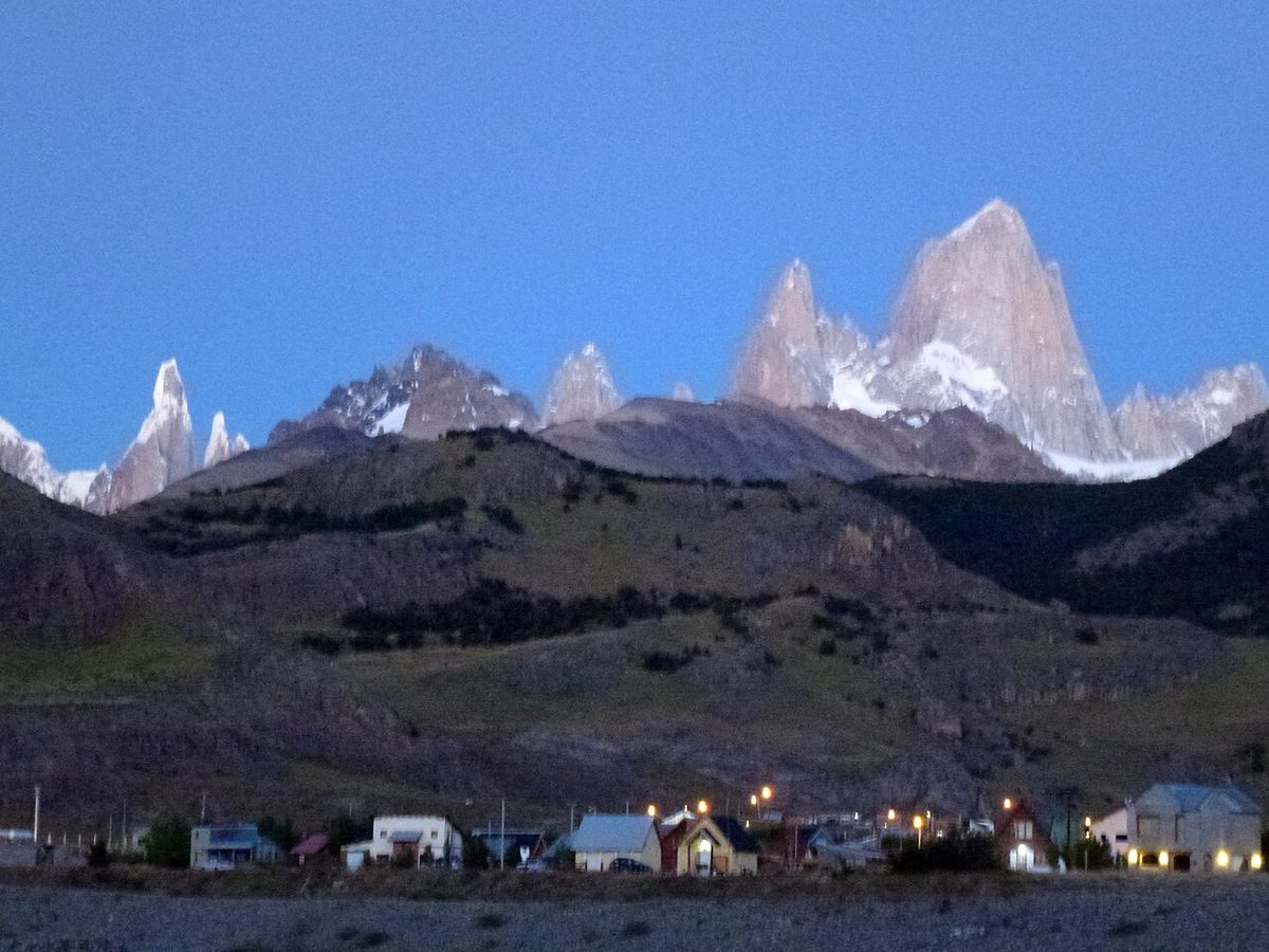 Cerro Torre wrapped in cloud above the Adela range, the famously shy peak seen from the Laguna Torre trail