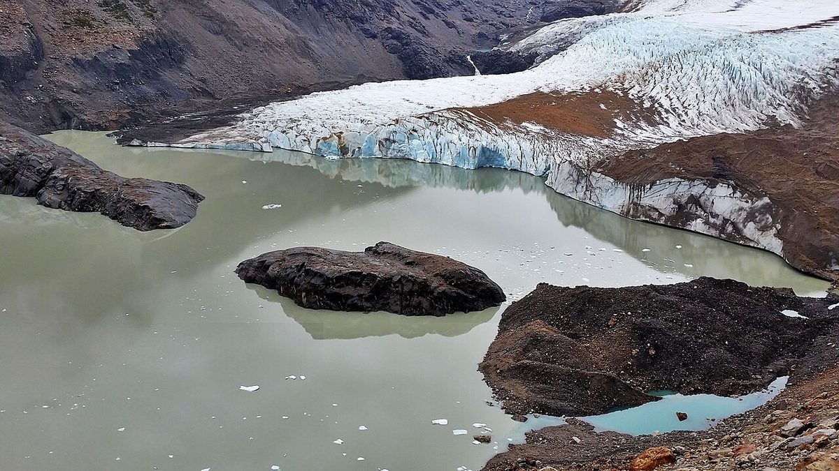 Icebergs from the Grande glacier floating on Laguna Torre beneath the Cerro Torre massif in Patagonia