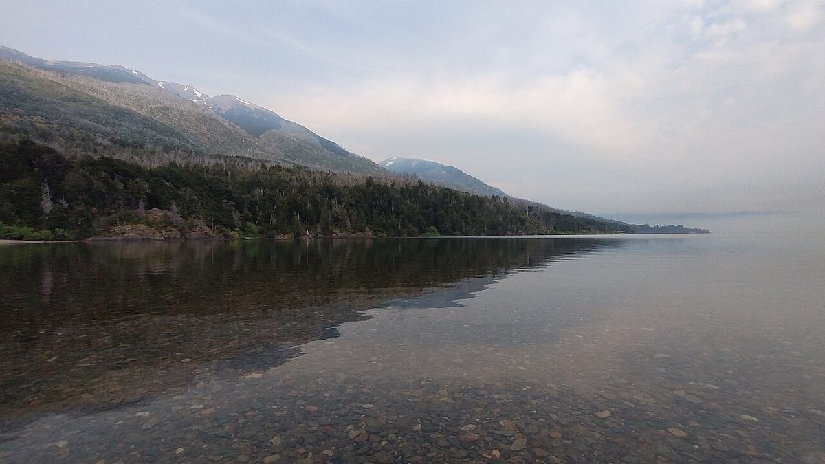 Turquoise lake and forested mountains in Los Alerces National Park, Patagonia
