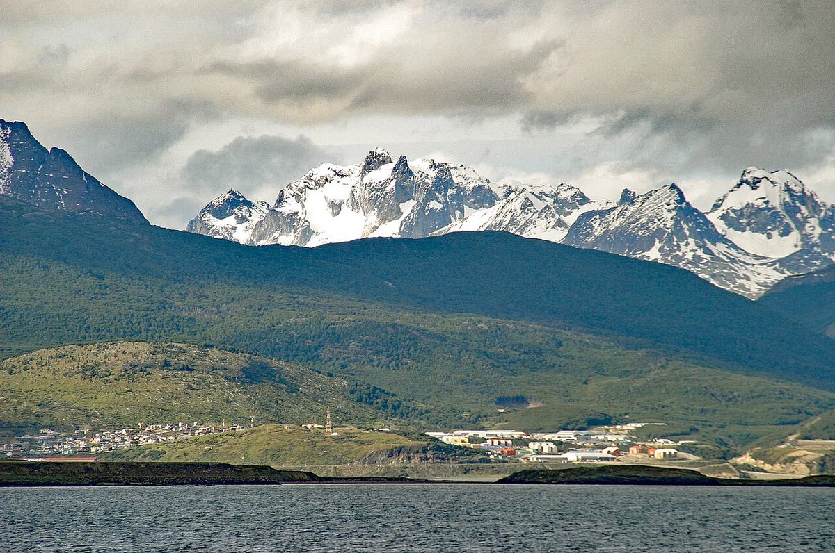 Ushuaia city on the Beagle Channel with the Fuegian Andes behind, the base for the best things to do in Ushuaia