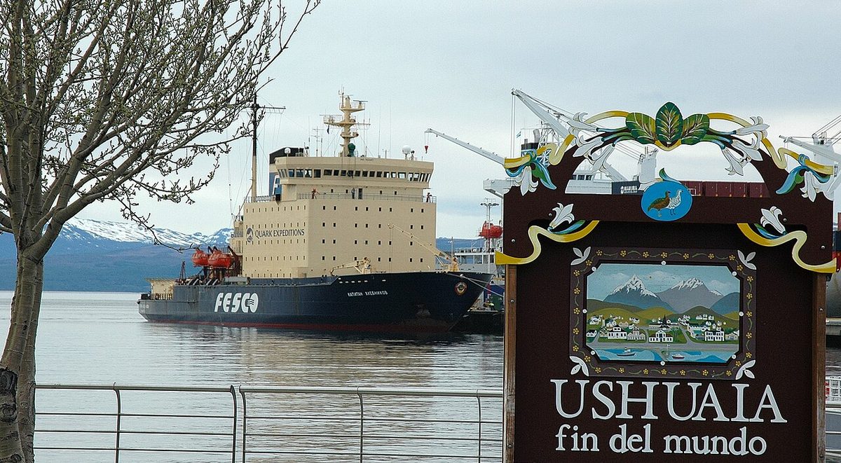 Snow-covered city of Ushuaia and the Fuegian Andes above the Beagle Channel in winter