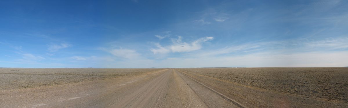 A car on a remote road in Argentine Patagonia