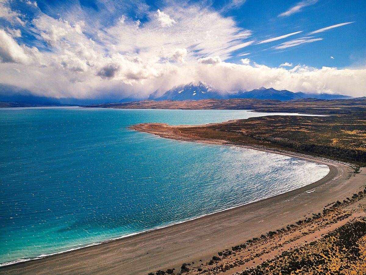 Wind streaking the surface of Lago Sarmiento in Torres del Paine, the open sector where Patagonian gusts build through the afternoon and destabilise walking