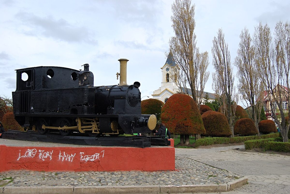 The Plaza de Armas in central Puerto Natales, surrounded by the streets where most trekkers rent gear and buy supplies